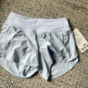 Lululemon size 4 Speed Up 4 inch shorts.